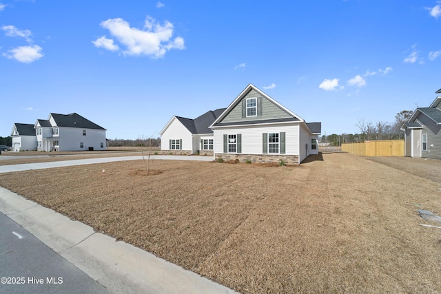 view of front of home featuring stone siding