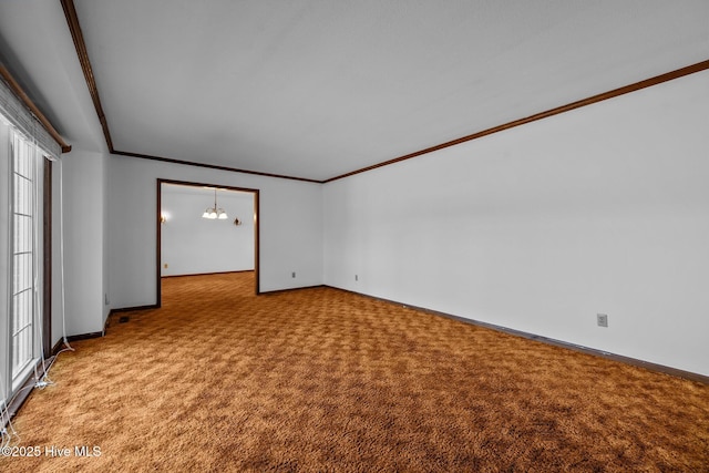 empty room featuring ornamental molding, light carpet, and a chandelier