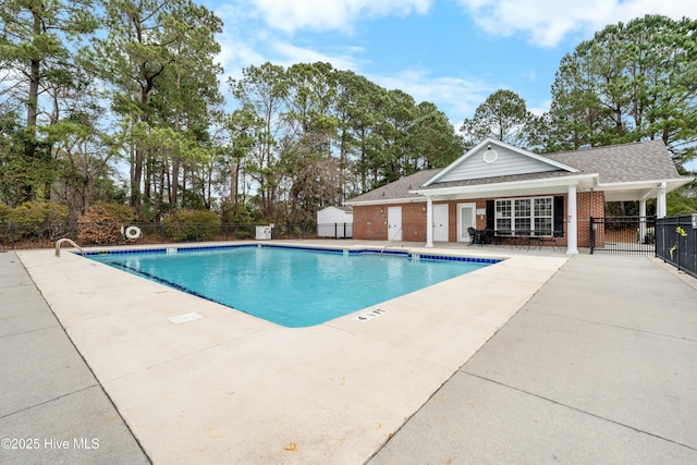 view of swimming pool featuring a patio