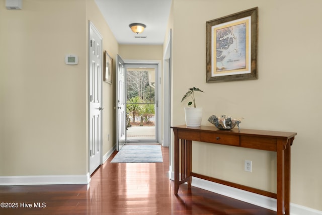 doorway to outside with dark hardwood / wood-style flooring