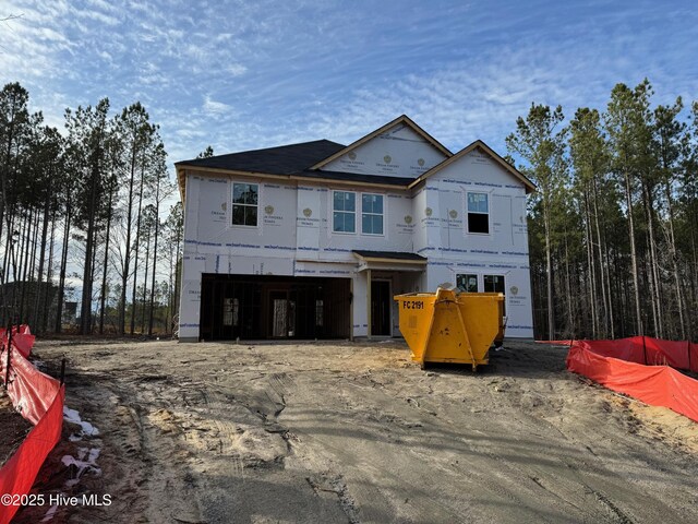 view of front of property featuring a garage