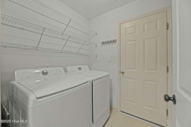 laundry area featuring separate washer and dryer