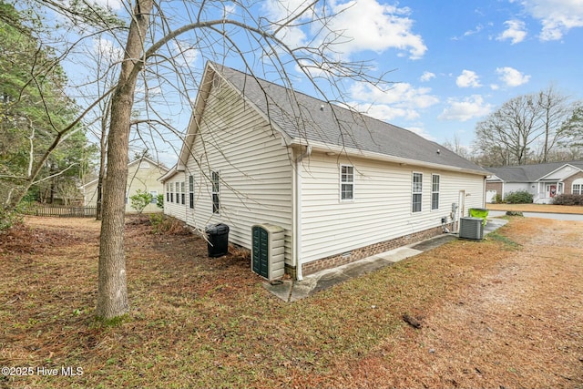 view of side of home with cooling unit