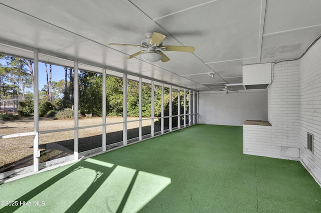 unfurnished sunroom with a wealth of natural light