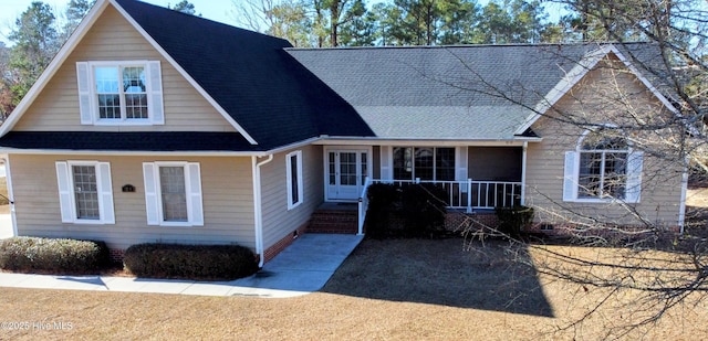 view of front of property featuring covered porch