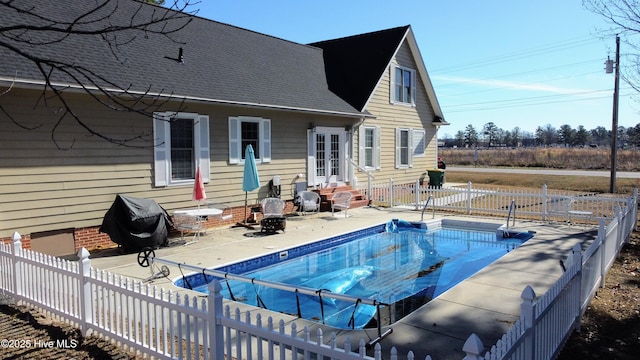 rear view of property with a patio