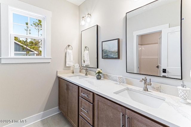 bathroom featuring vanity and tile patterned floors