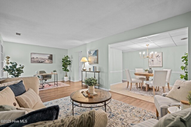 unfurnished room featuring dark wood-type flooring and a textured ceiling