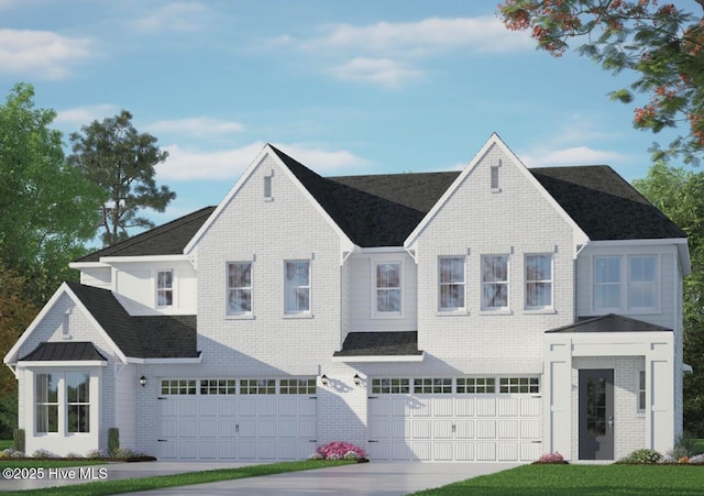 view of front of house featuring concrete driveway, brick siding, and a garage