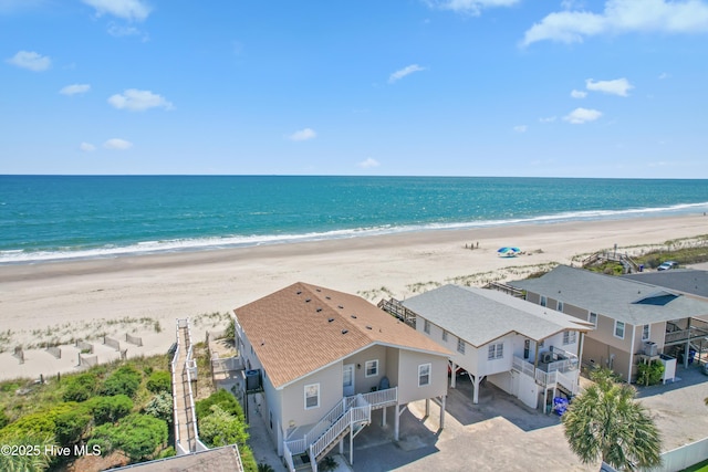 property view of water featuring a beach view