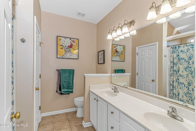 bathroom with vanity, a shower with shower curtain, tile patterned floors, and toilet