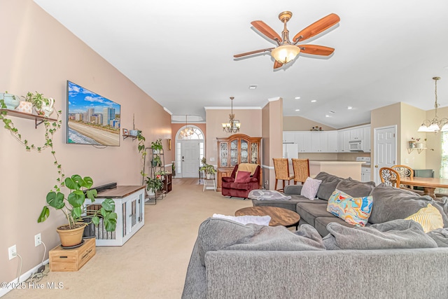 living room with vaulted ceiling, ceiling fan with notable chandelier, light carpet, and crown molding