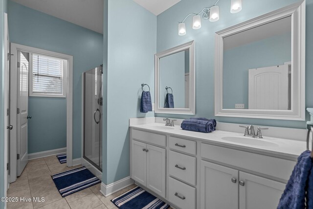 bathroom with tile patterned floors and a tub to relax in