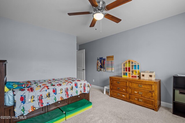 bedroom with light carpet and a closet