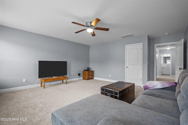 living room with carpet flooring and ceiling fan