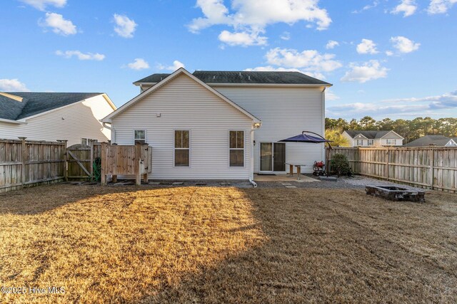 back of property with a patio area