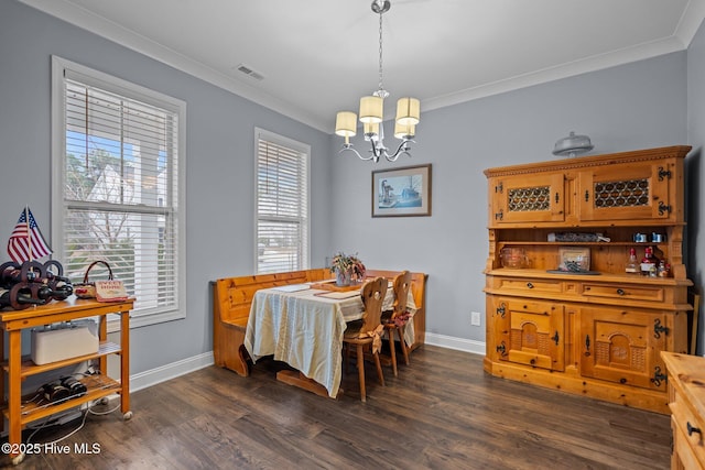 dining space with crown molding, a notable chandelier, and dark hardwood / wood-style flooring