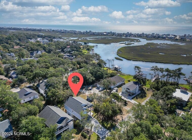 bird's eye view with a water view