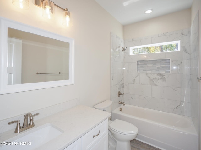 full bathroom with vanity, shower / bathing tub combination, and toilet