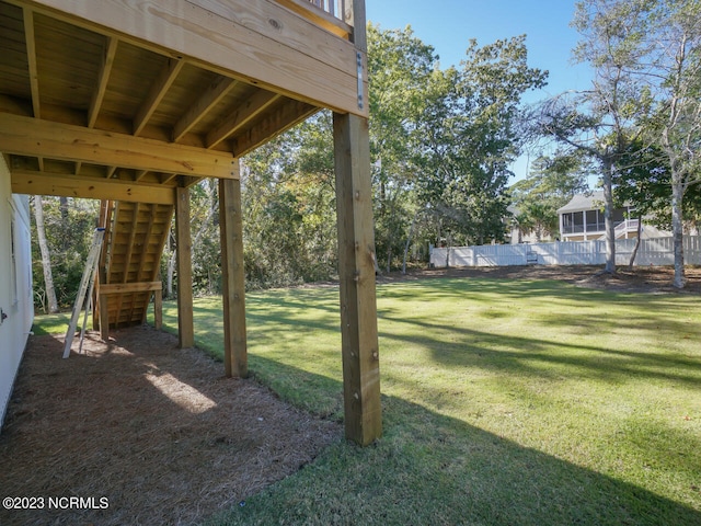 view of yard featuring stairs and fence