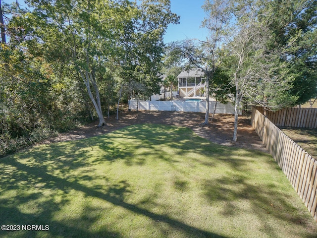 view of yard featuring a fenced backyard