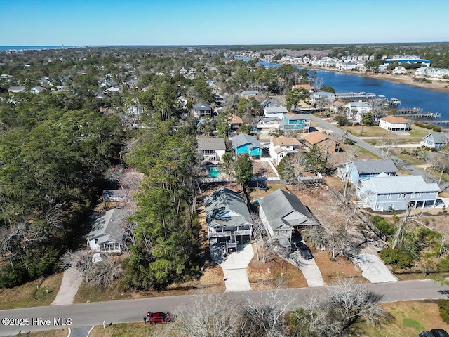 aerial view featuring a residential view and a water view