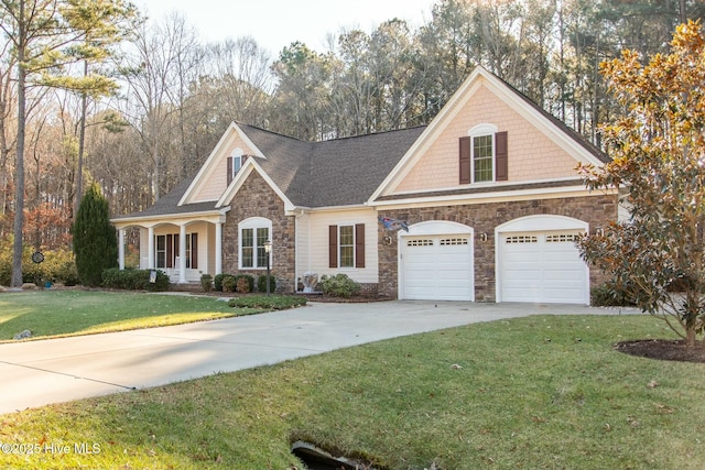 view of front facade with a garage and a front yard