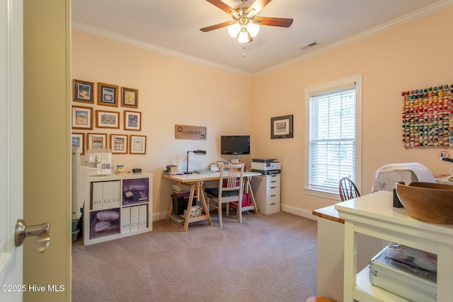 carpeted office with ornamental molding and ceiling fan