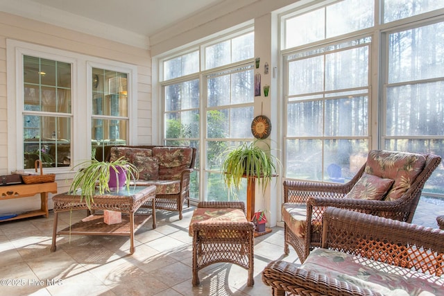 sunroom featuring plenty of natural light