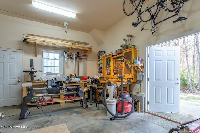 garage with a workshop area