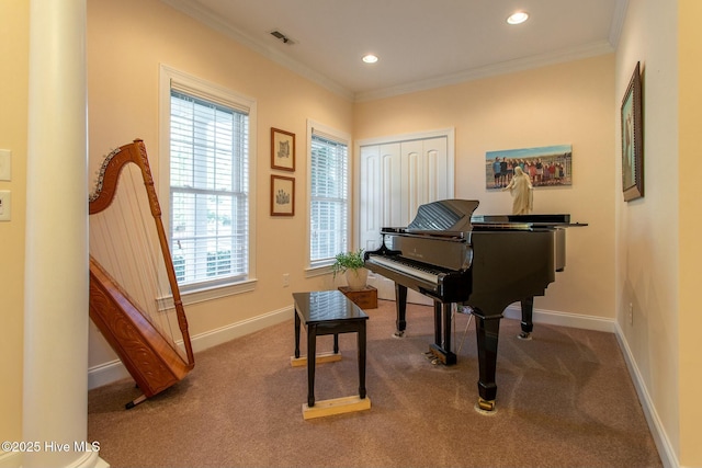 miscellaneous room with crown molding and carpet