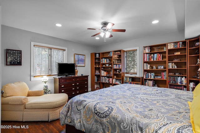 bedroom featuring recessed lighting and wood finished floors