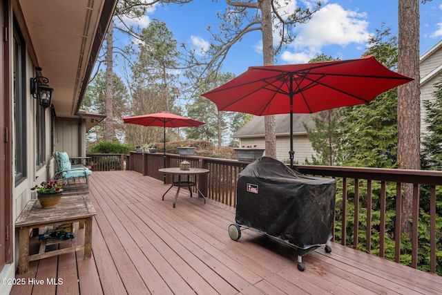 wooden deck with area for grilling