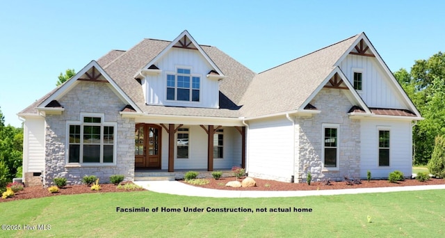 view of front of house featuring board and batten siding, covered porch, a shingled roof, and a front lawn