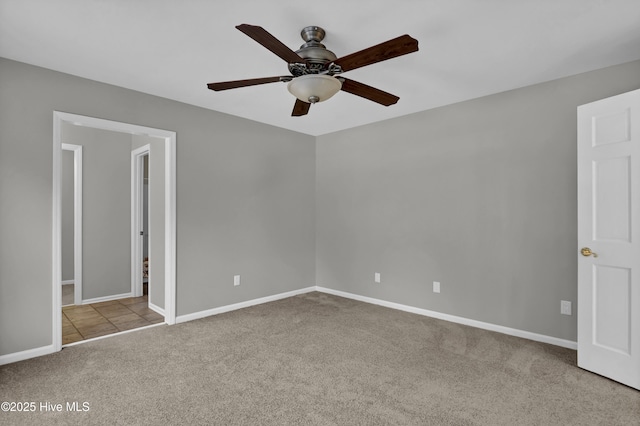 unfurnished bedroom with light carpet and ceiling fan