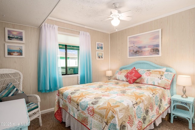 carpeted bedroom featuring crown molding, ceiling fan, and a textured ceiling