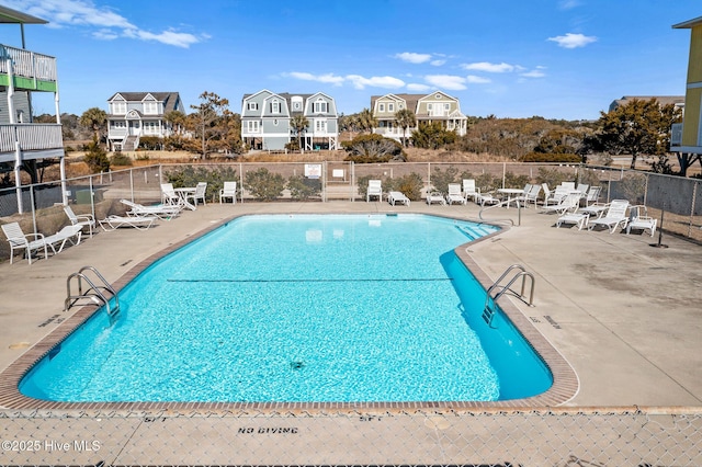 view of pool featuring a patio