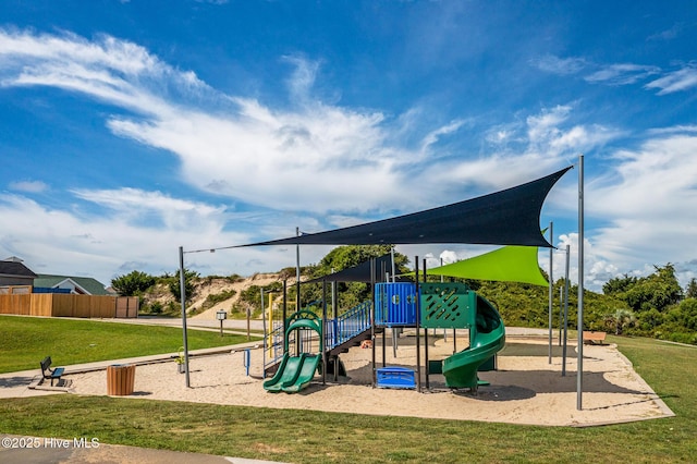 view of playground with a yard