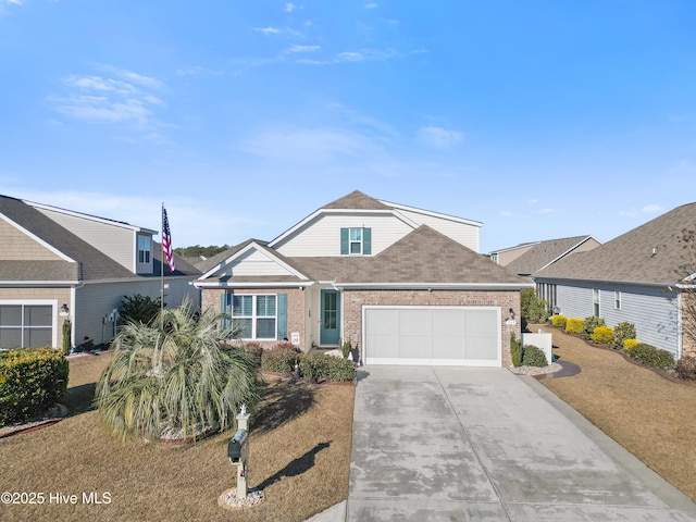 view of front of property featuring a front yard and a garage