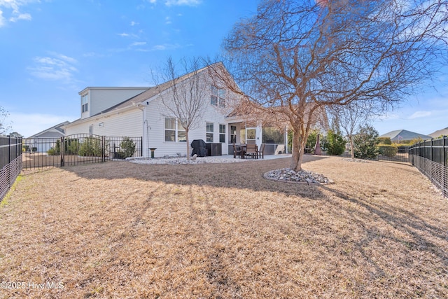 back of property featuring a patio