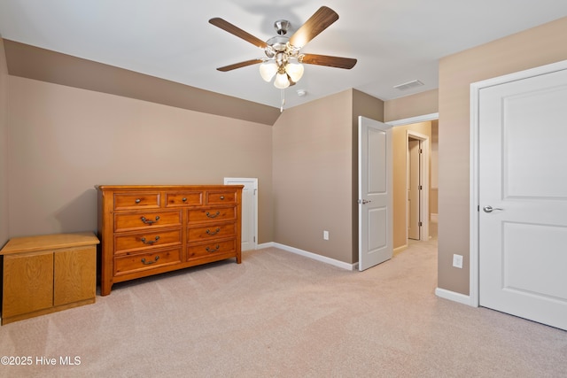 bedroom with ceiling fan and light carpet