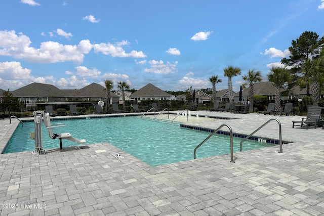 view of pool featuring a patio