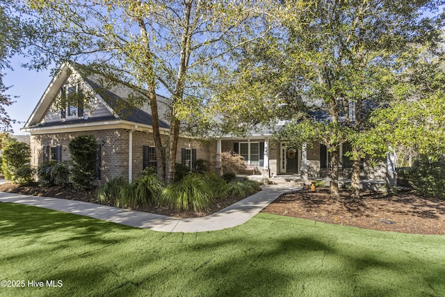 view of front of home featuring a front yard