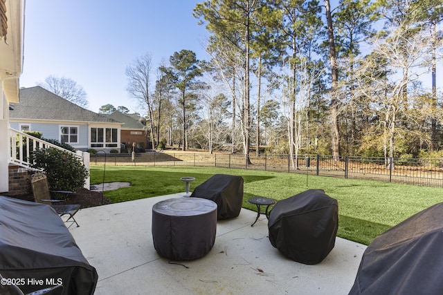 view of patio with a grill