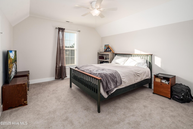 bedroom with lofted ceiling, light carpet, and ceiling fan