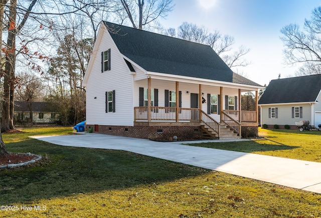 view of front of house with a front yard and covered porch