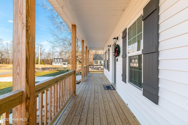 deck featuring covered porch