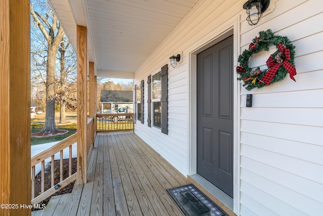 wooden deck with a porch