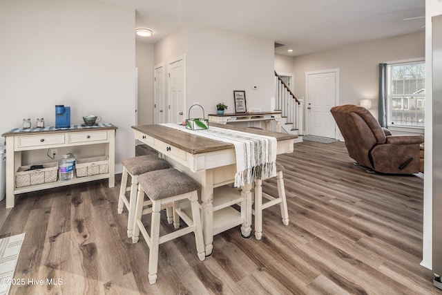 dining room featuring hardwood / wood-style flooring