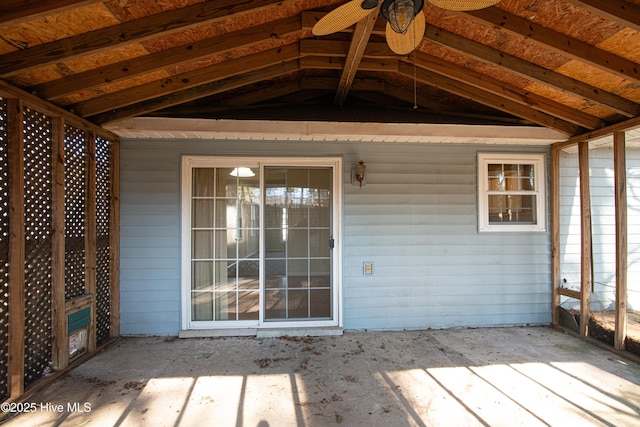 exterior space featuring vaulted ceiling